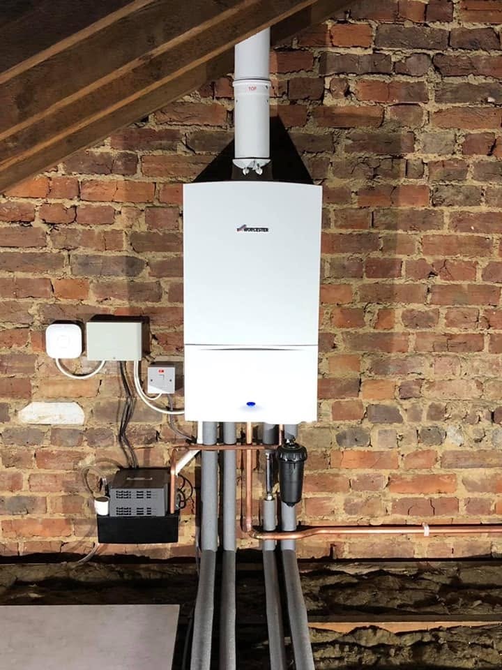 L&B boiler installation with neatly arranged pipework